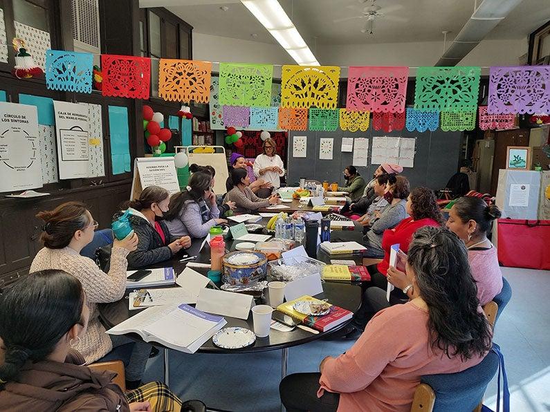 community health workers gathered at a table