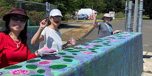 smiling women at table