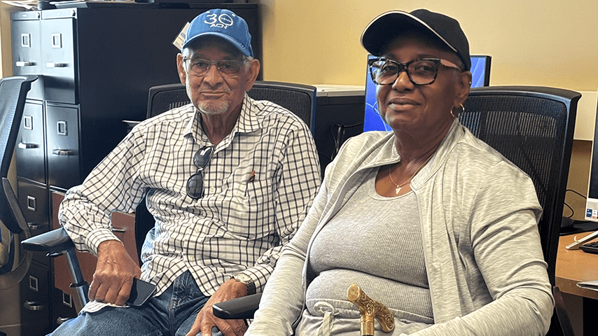 older man and woman in computer classroom