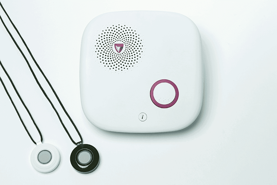 White MGHome machine with two help buttons