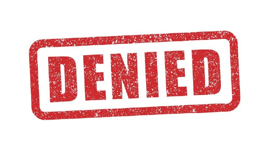 Words denied written in red and large, like it's been stamped on a piece of paper.