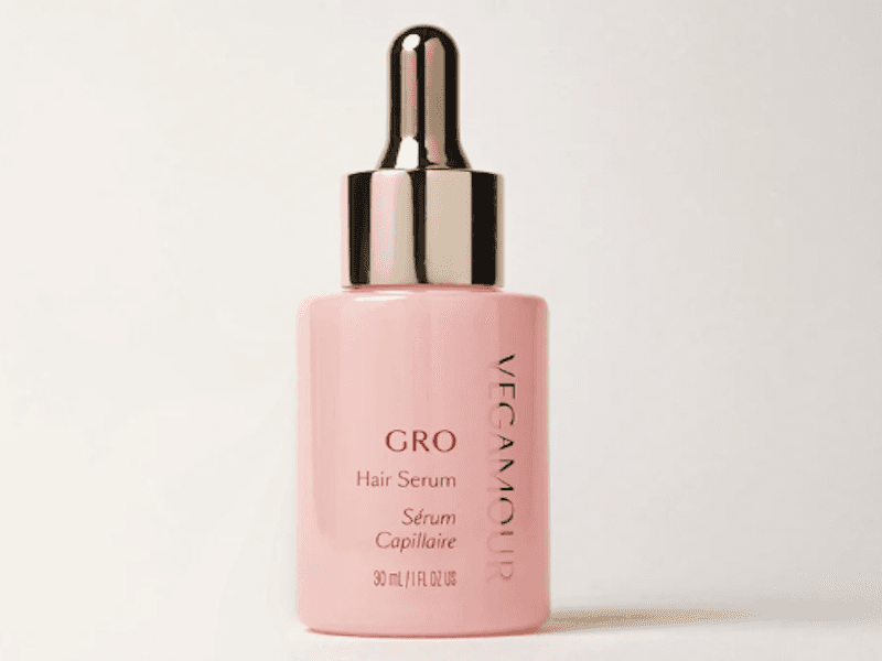 A small pink container of Vegamour GRO hair serum
