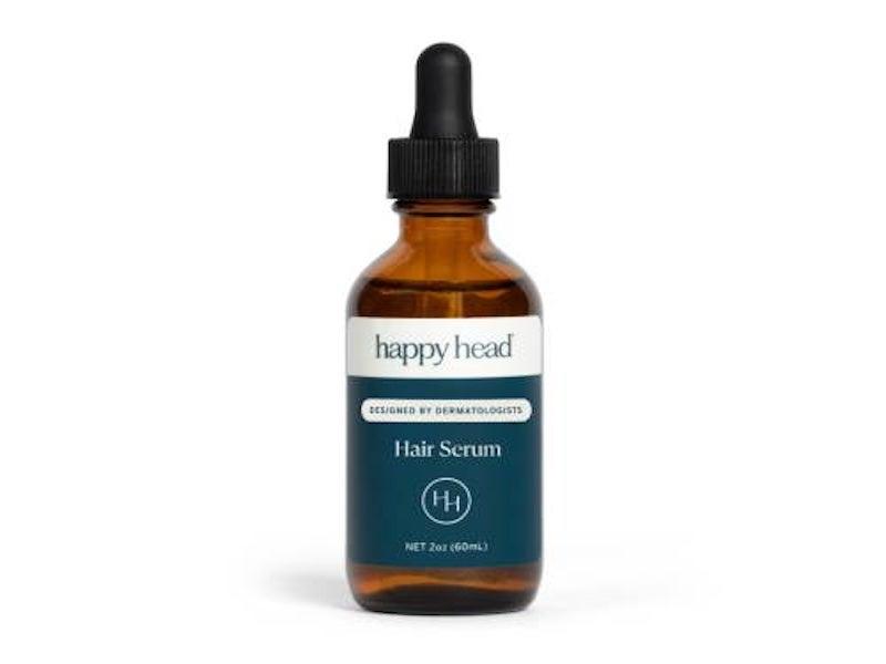 A small container of Happy Head Hair Serum