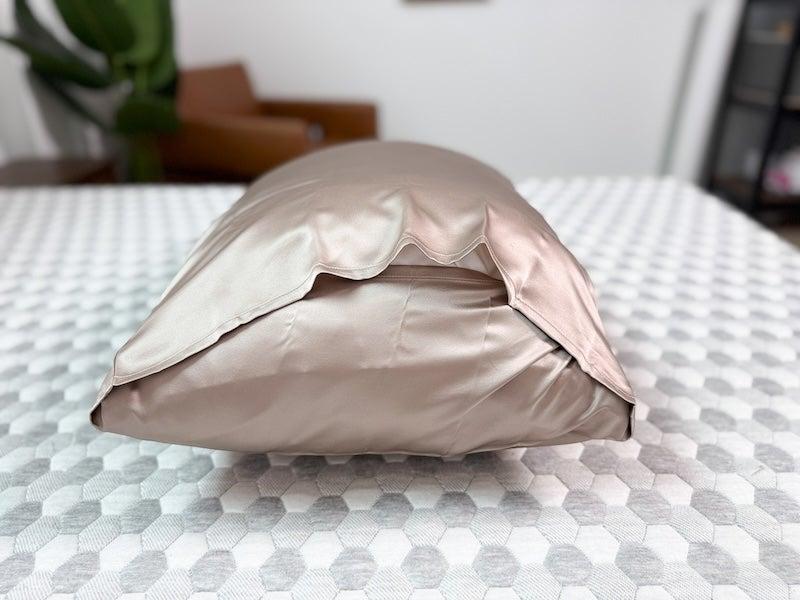 A side view of the Brooklinen silk pillowcase on a pillow