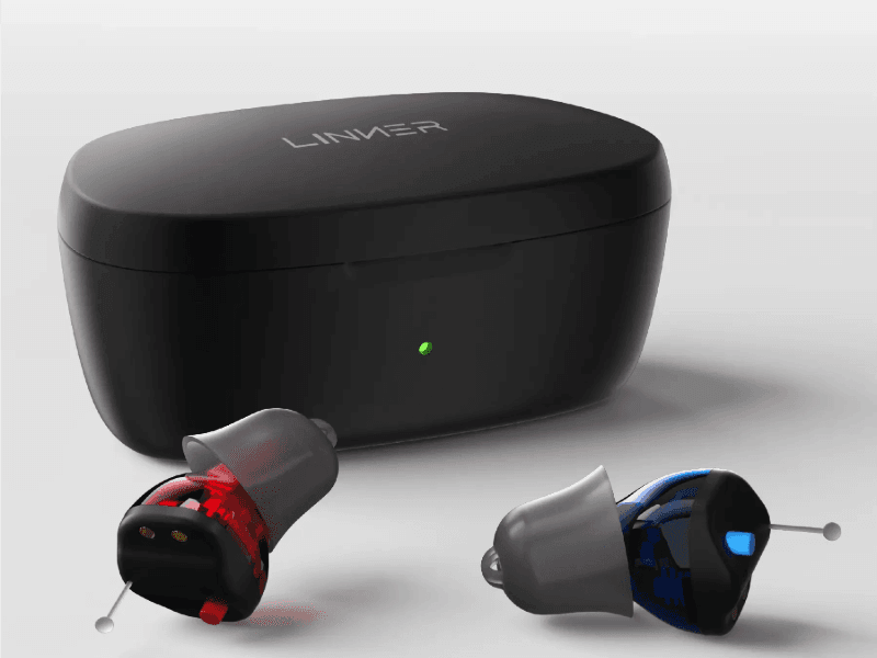 The Linner Saturn hearing aids and their charging case