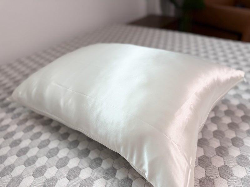The Blissy Silk Pillowcase on a pillow