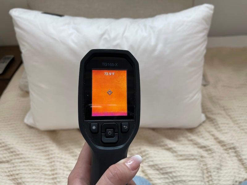 A thermal heat gun reads the signature of the Silk & Snow pillow