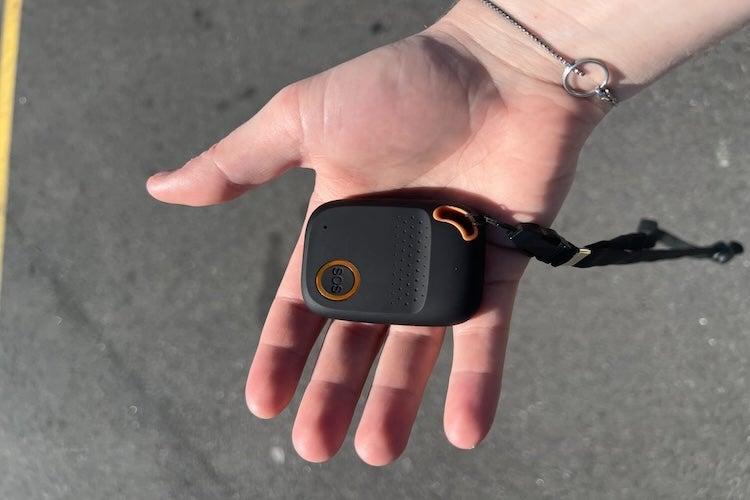 outstretched hand holding Bay Alarm All-in-One