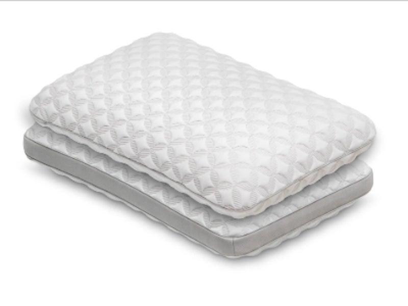 A white, quilted Talalay Latex pillow with no case