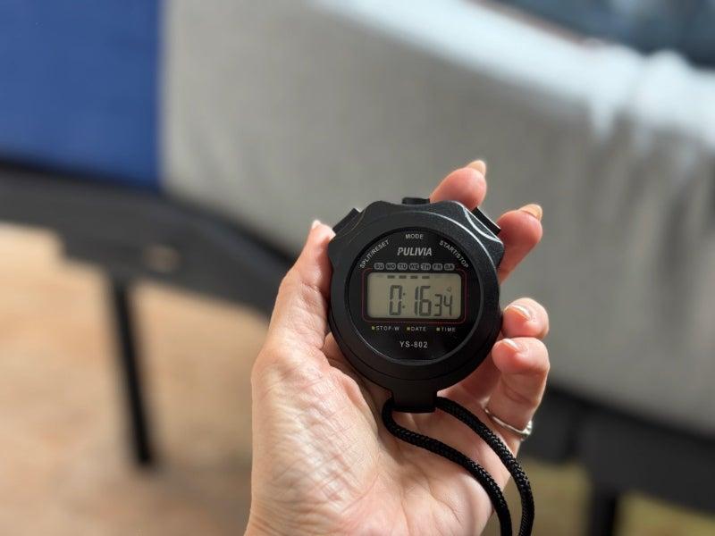 A stopwatch showing 16 seconds in front of the DreamCloud Adjustable Base