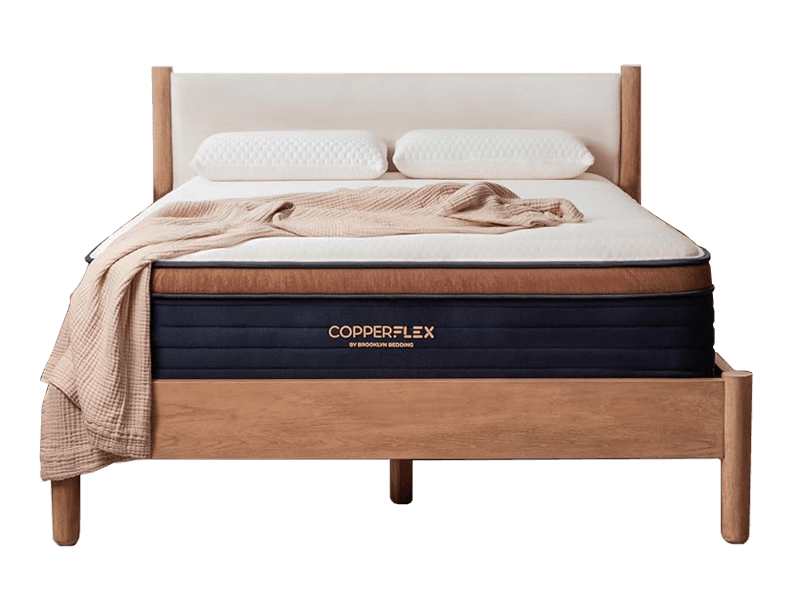 The Brooklyn Bedding CopperFlex Memory Foam Mattress on a wooden frame against a white background