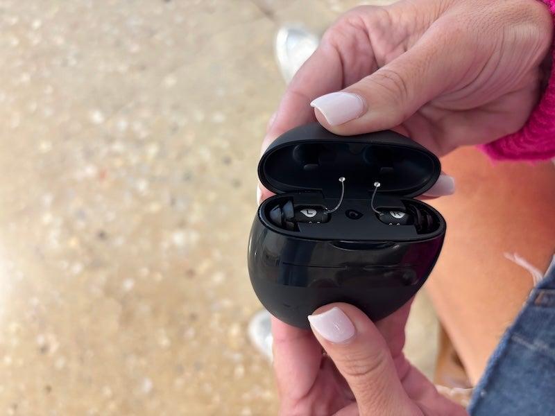 The Eargo 8 hearing aids in the on-the-go charging case.