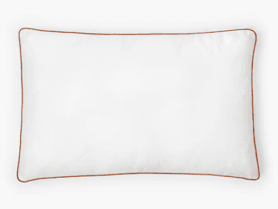 A Saatva Latex pillow on a white background