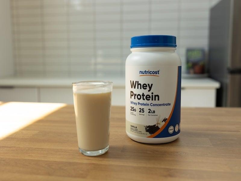 Container of Nutricost Whey Protein Concentrate powder