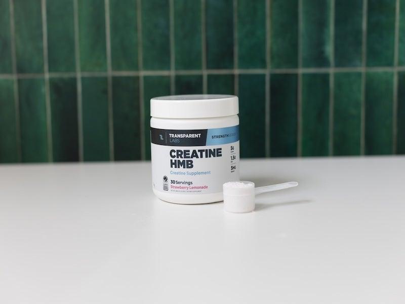 The tub of Transparent Labs creatine with a scoop
