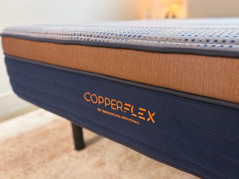 A close-up picture of the end of the Brooklyn Bedding CopperFlex Memory Foam mattress