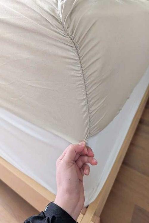 The Sleep Number True Temp fitted sheet on a mattress