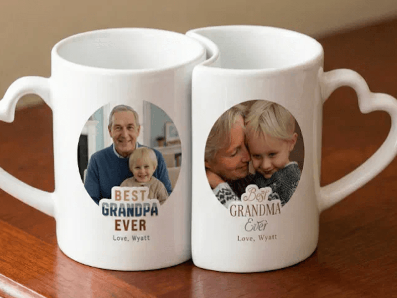 Set of mugs with photos of grandparents and heart handles. Text says “Best Grandpa Ever” and “Best Grandma Ever”