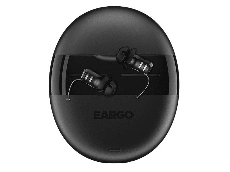 The Eargo 8 hearing aids in their charging case