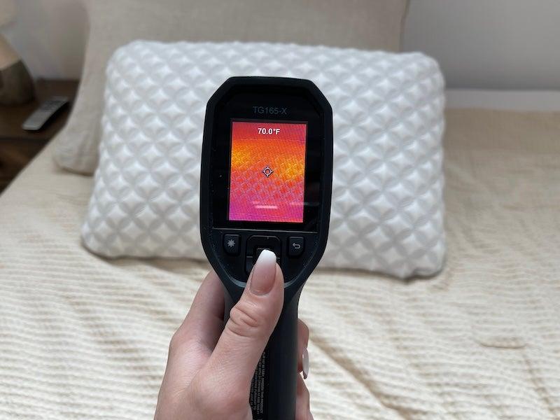 A thermal gun pointed at the Brooklyn Bedding Talalay Latex reads “70 degrees"