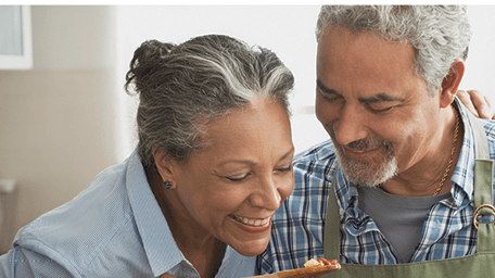 older couple cooking together
