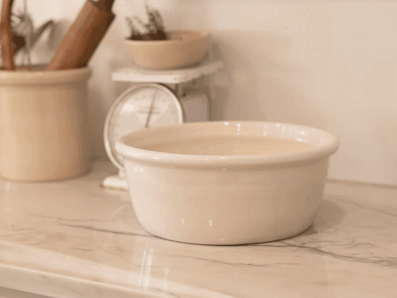 The Hillside Heirloom Bowl on a white marble kitchen countertop