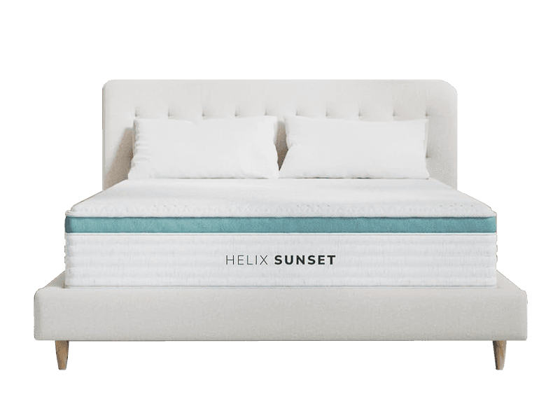 The Helix Sunset mattress on a white bed frame