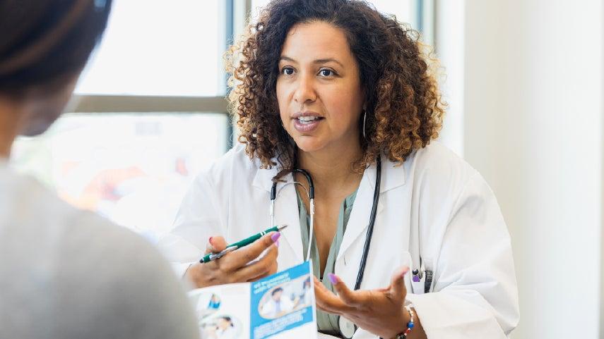 Doctor speaks to patient.
