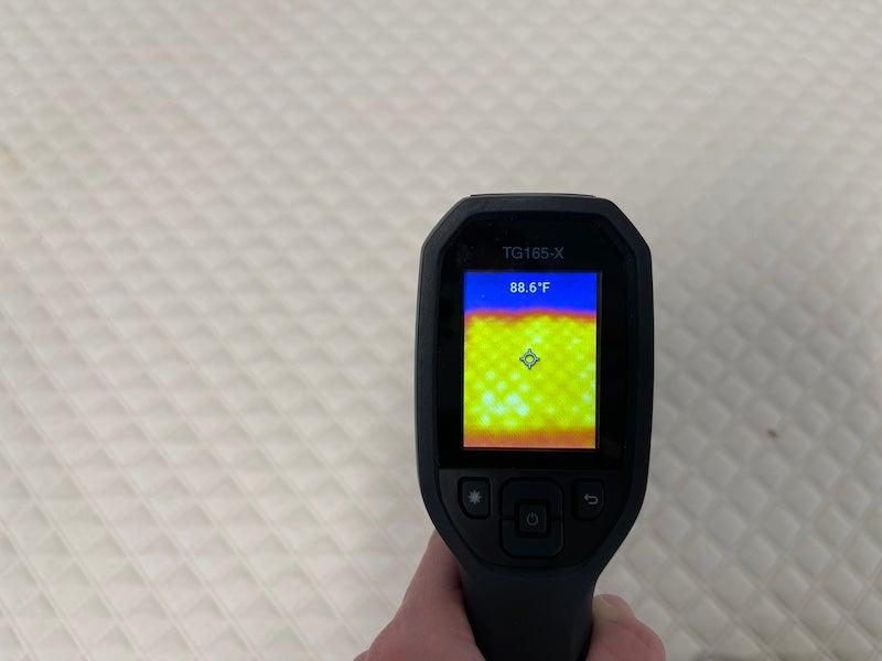 A temp gun registers the Nolah’s heat.