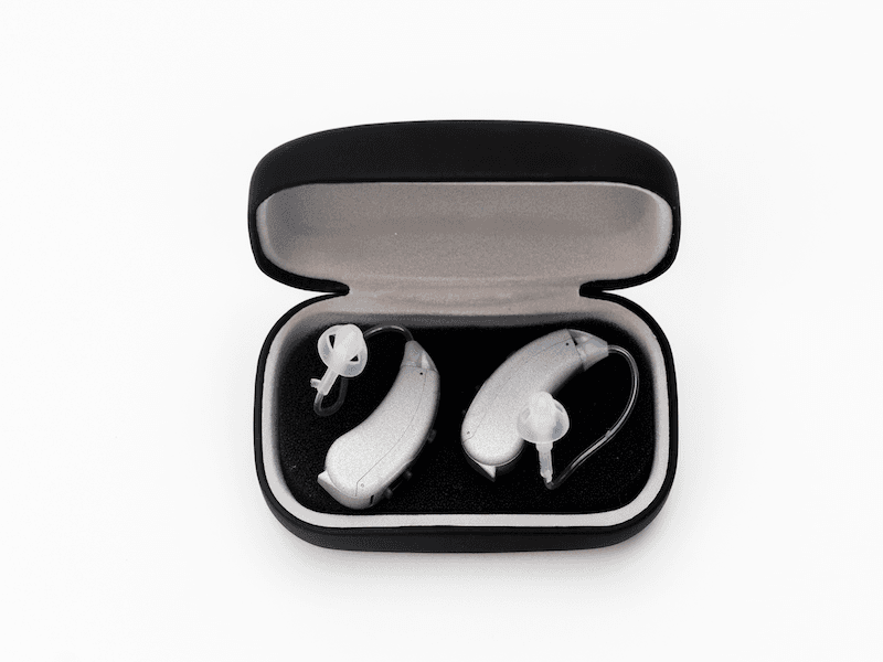 Lexie Lumen hearing aids in case.